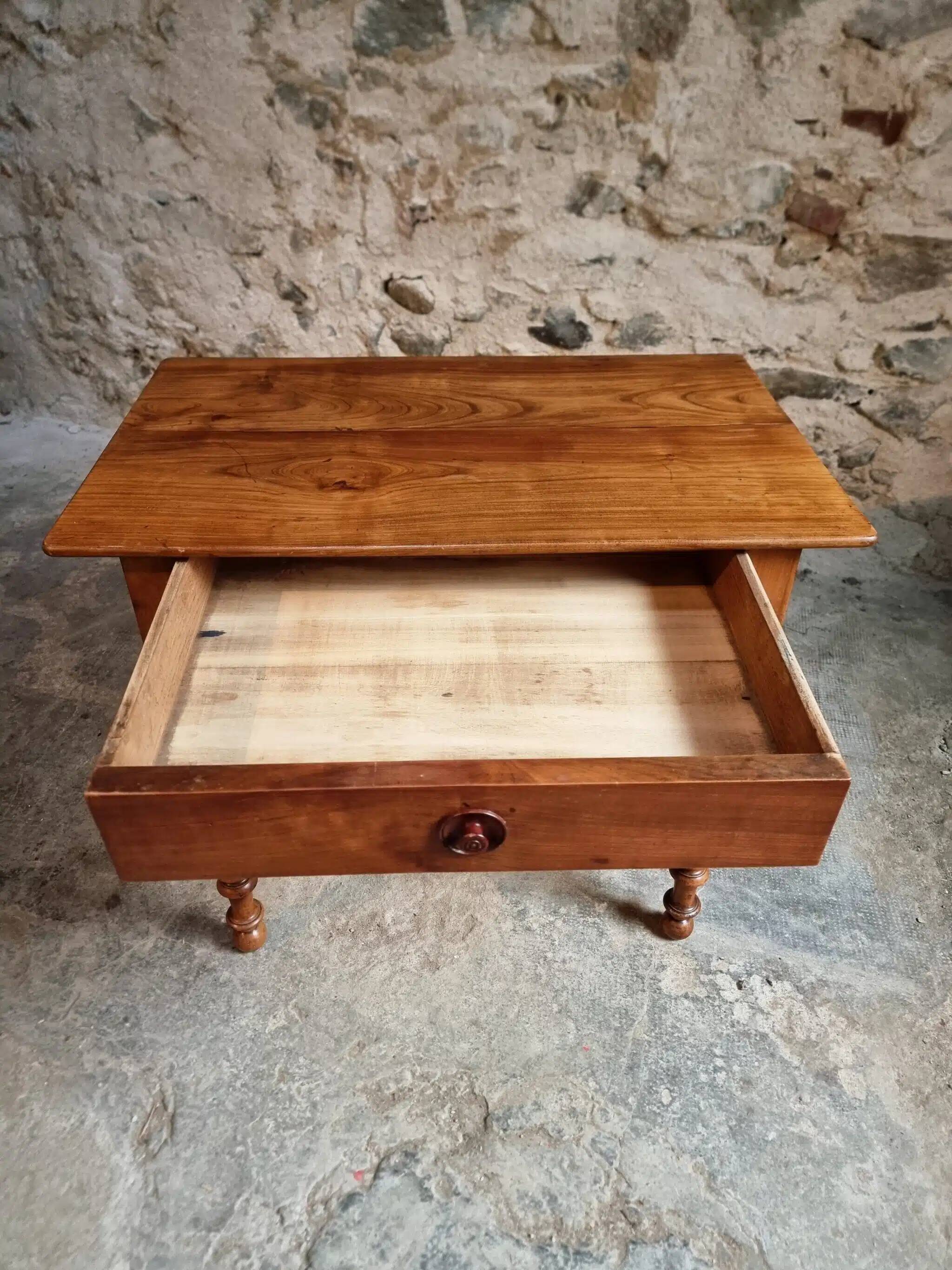 Small antique French writing table in walnut with a drawer, around 1900.