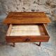 Small antique French writing table in walnut with a drawer, around 1900.