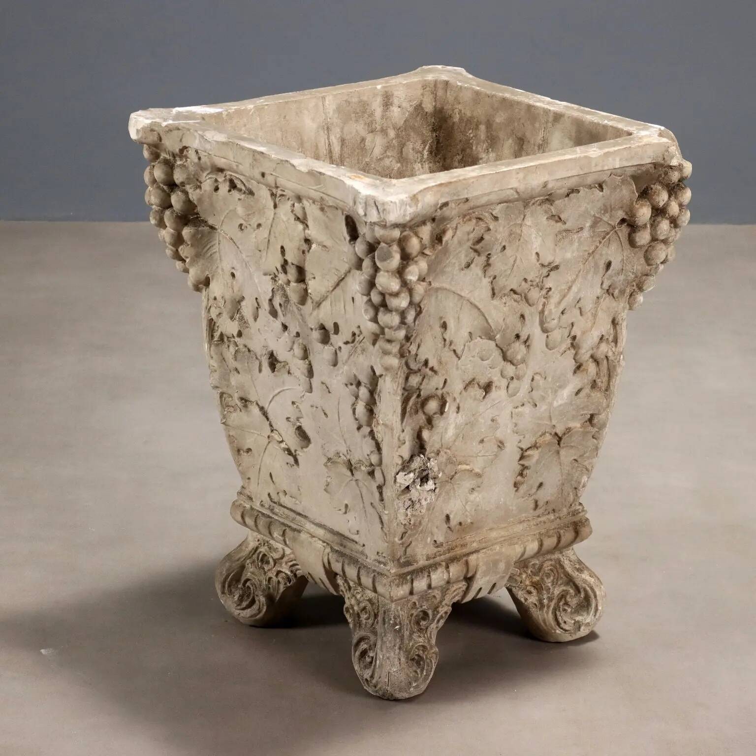 Antique plaster vase decorated with bunches of grapes, Italy, 19th century.