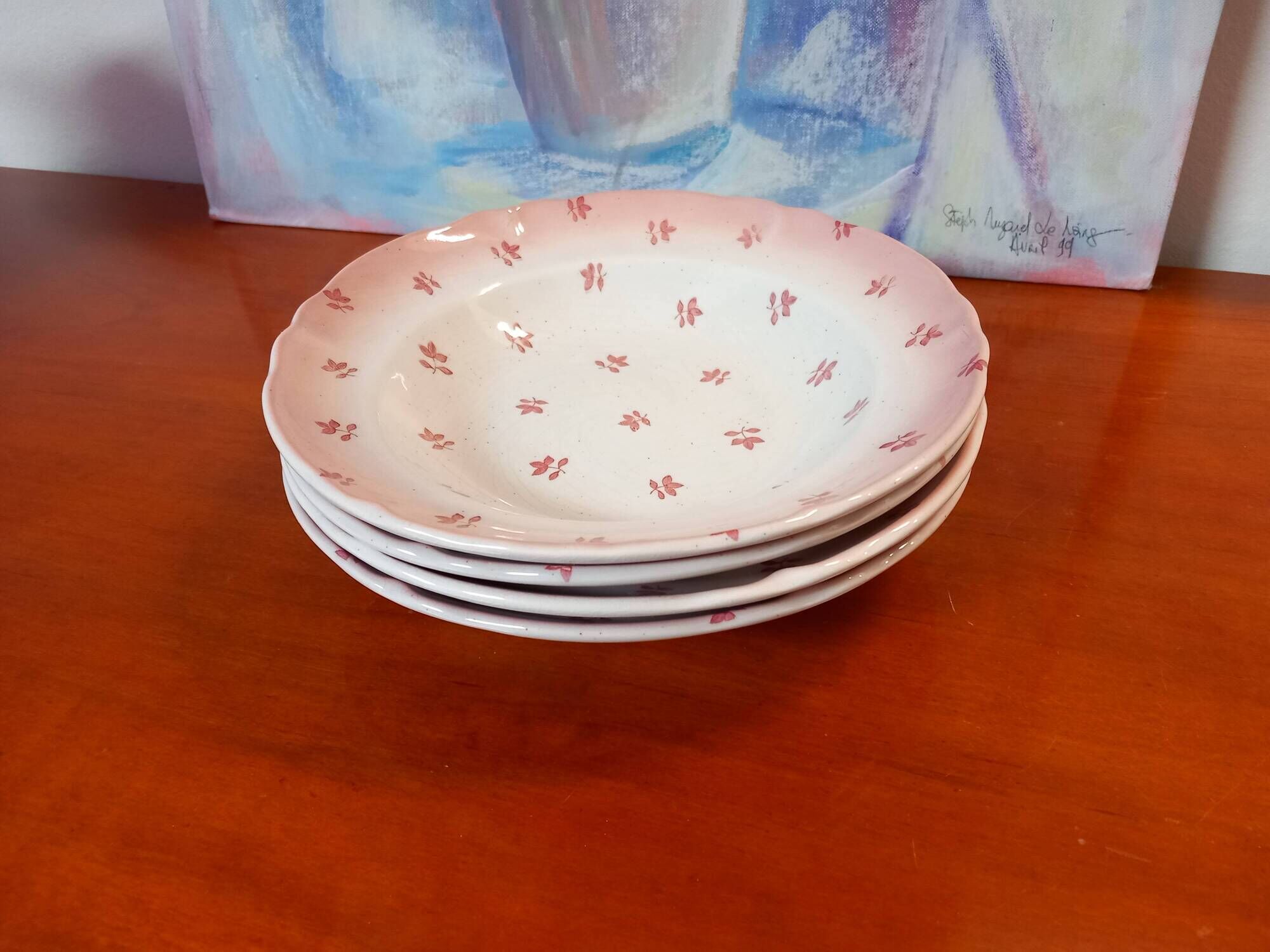 Set of 4 antique deep plates from St Amand in the "Vine Leaves" pattern.