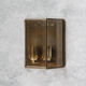 Wall sconce in brass and glass