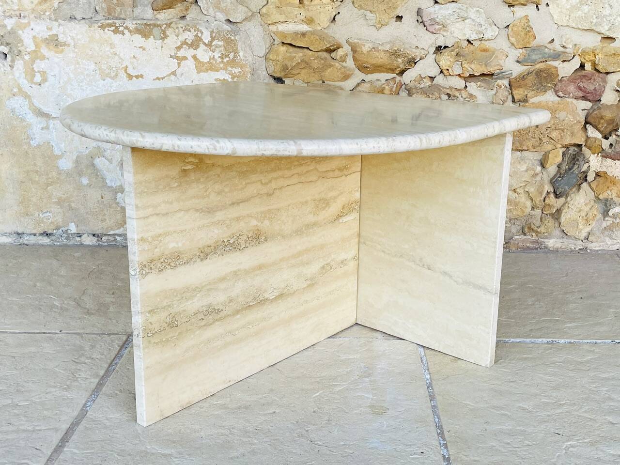 Vintage side table in travertine, circa 1980s.