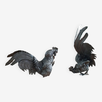 2 silver metal roosters