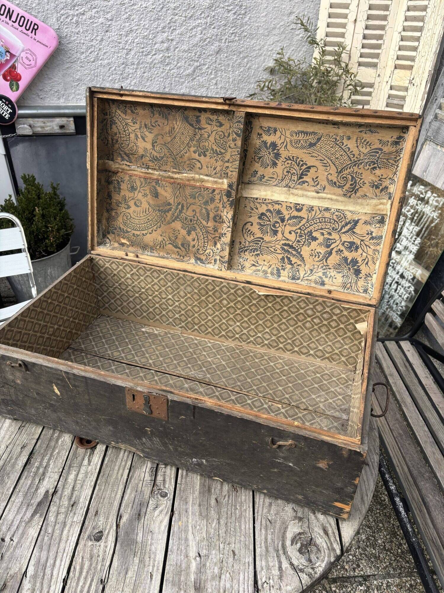 Black travel trunk