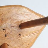 Brutalist tripod stool in carved wood, 1950s