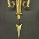 Paire d'appliques en bronze doré flèche et têtes d'aigle style Empire