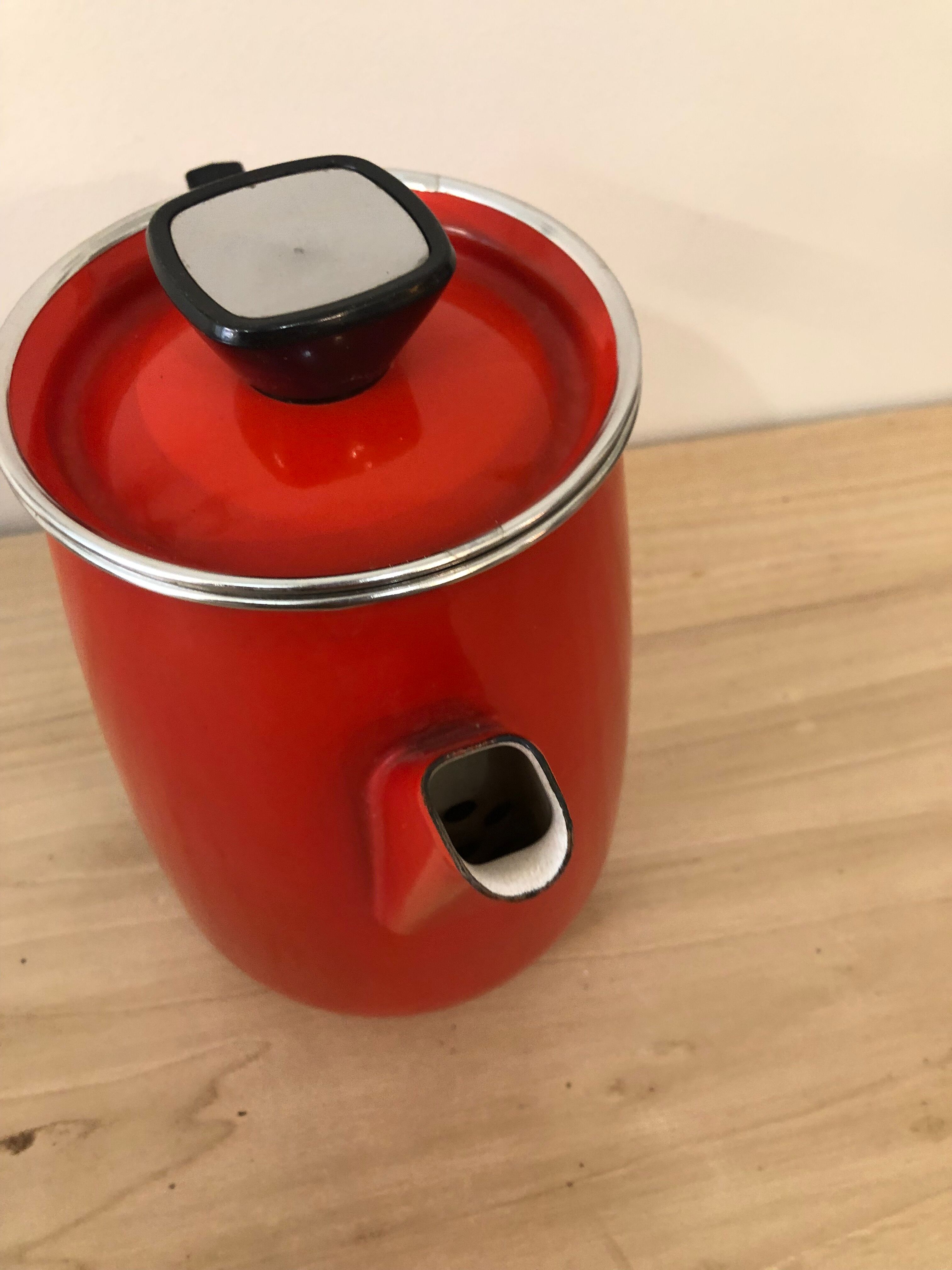 Red enamel coffee maker with filter