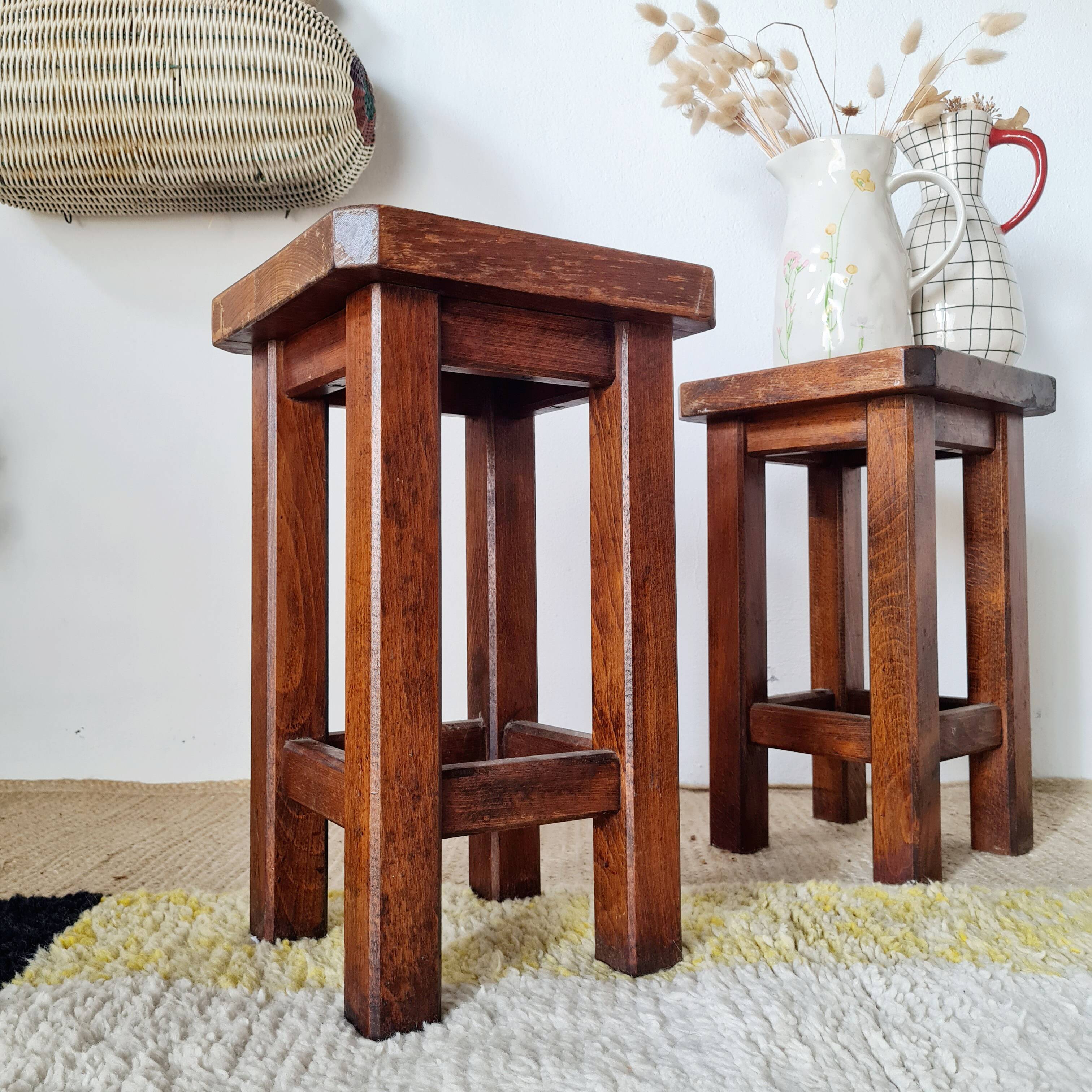 Pair of brutalist wooden stools, bedside tables.