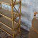 Pair of rattan shelves including a corner shelf