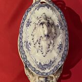 Large porcelain sauciere with blue and white decoration of the 19th century
