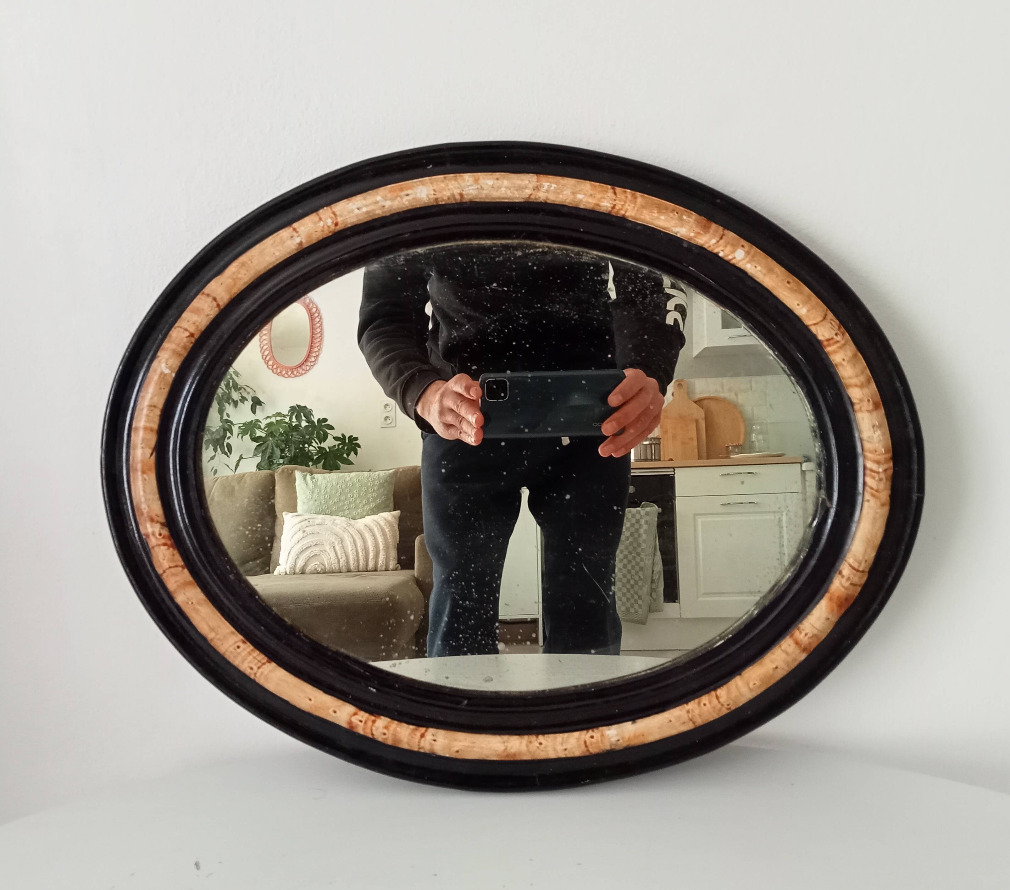 19th-century antique mirror in wood and stucco.