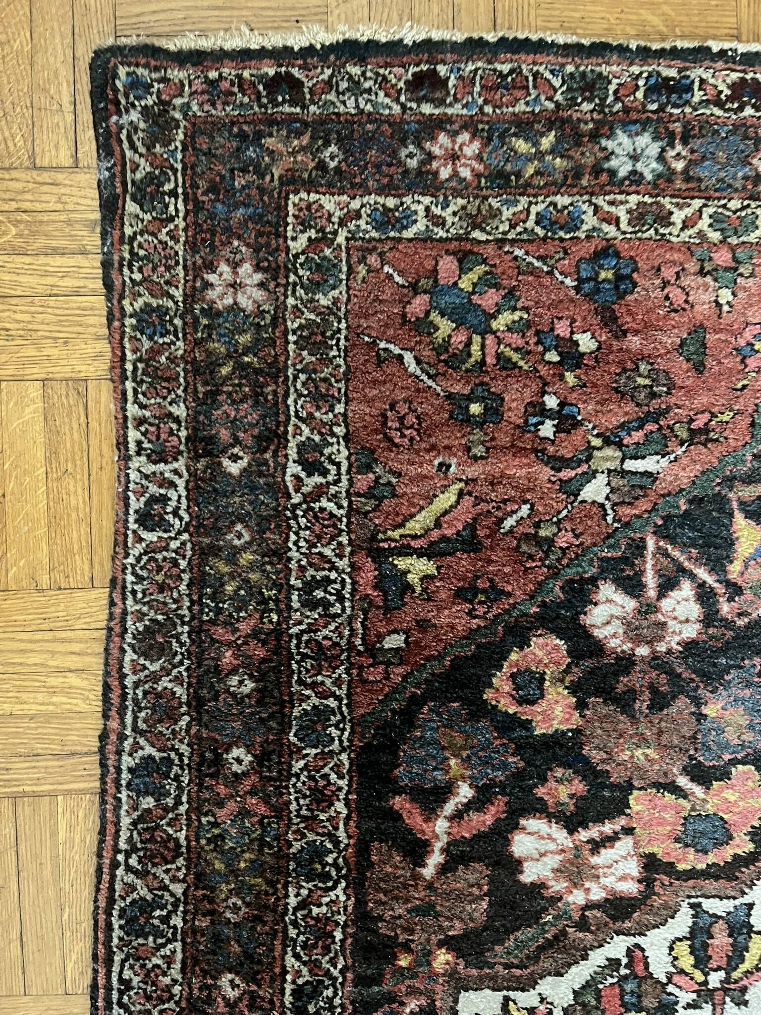 Antique handmade Hamadan Persian rug, ivory medallion on dark background 148x103.