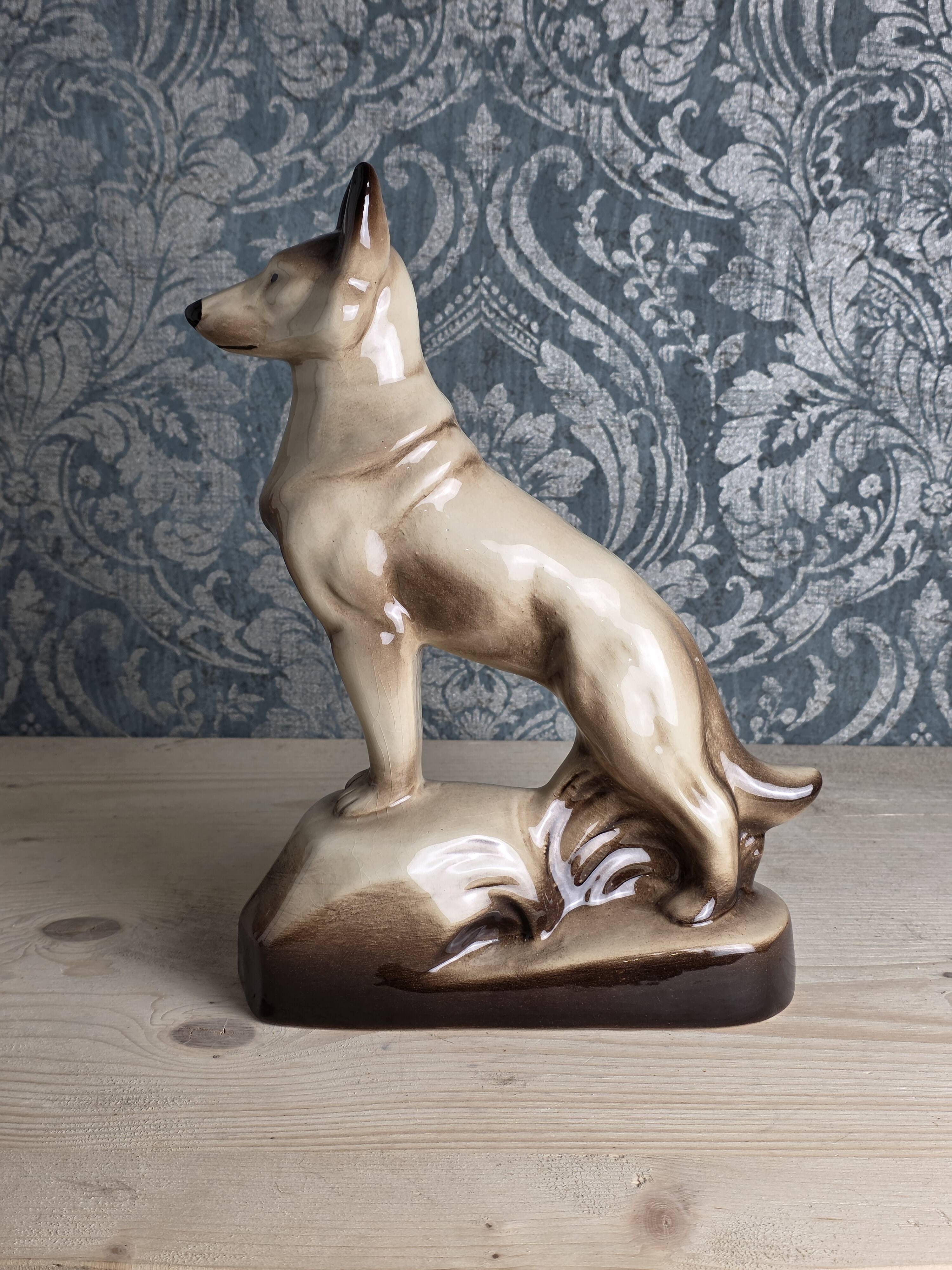 Porcelain shepherd dog, large decorative sculpture.