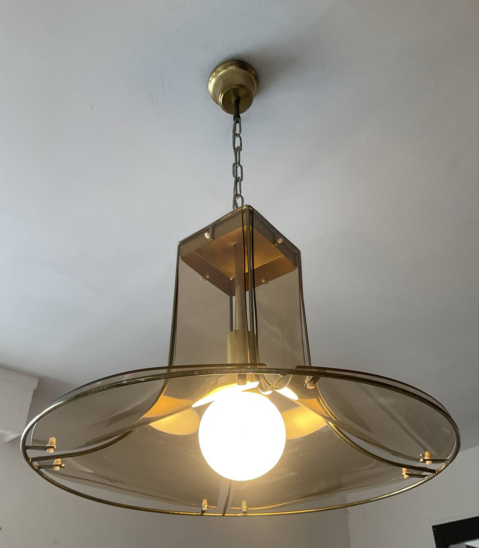 Italian suspension lamp in smoked glass and brass from the 1970s.