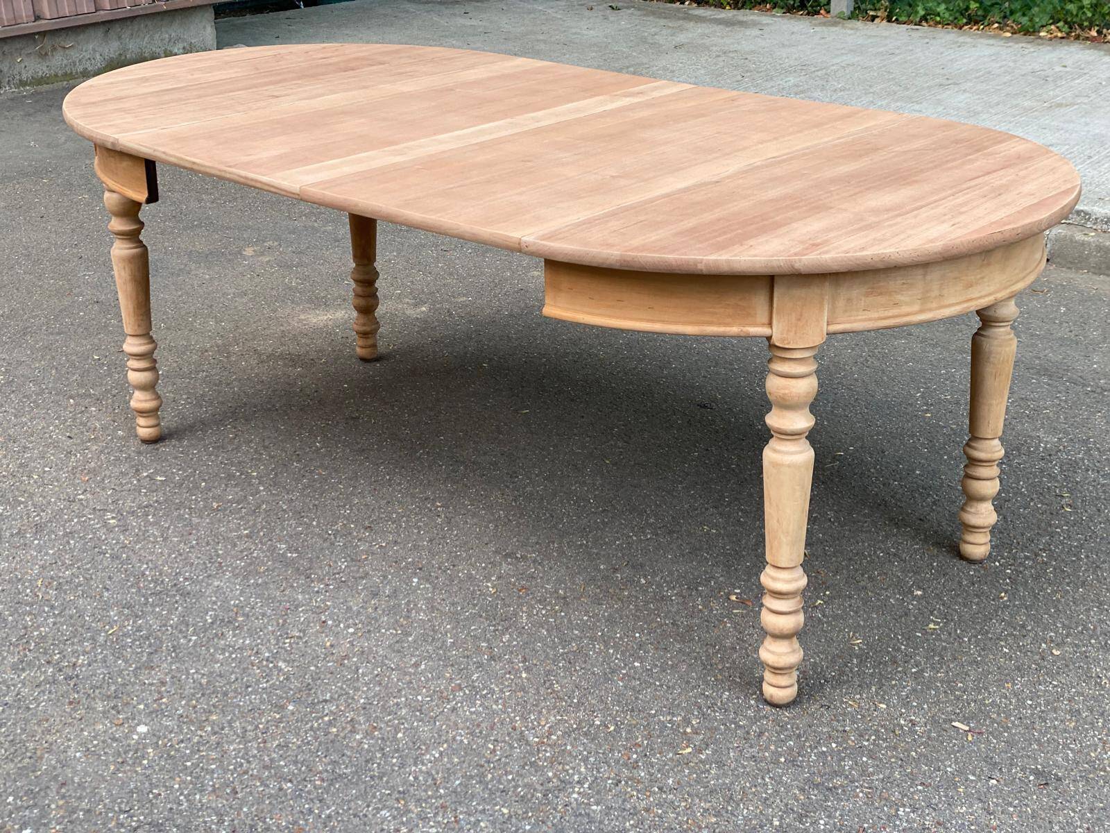 Round extendable dining table stripped in solid cherry wood France 1950