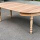 Round extendable dining table stripped in solid cherry wood France 1950
