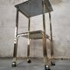 Side Table 1970s smoked glass/gold/wheels