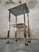 Side Table 1970s smoked glass/gold/wheels