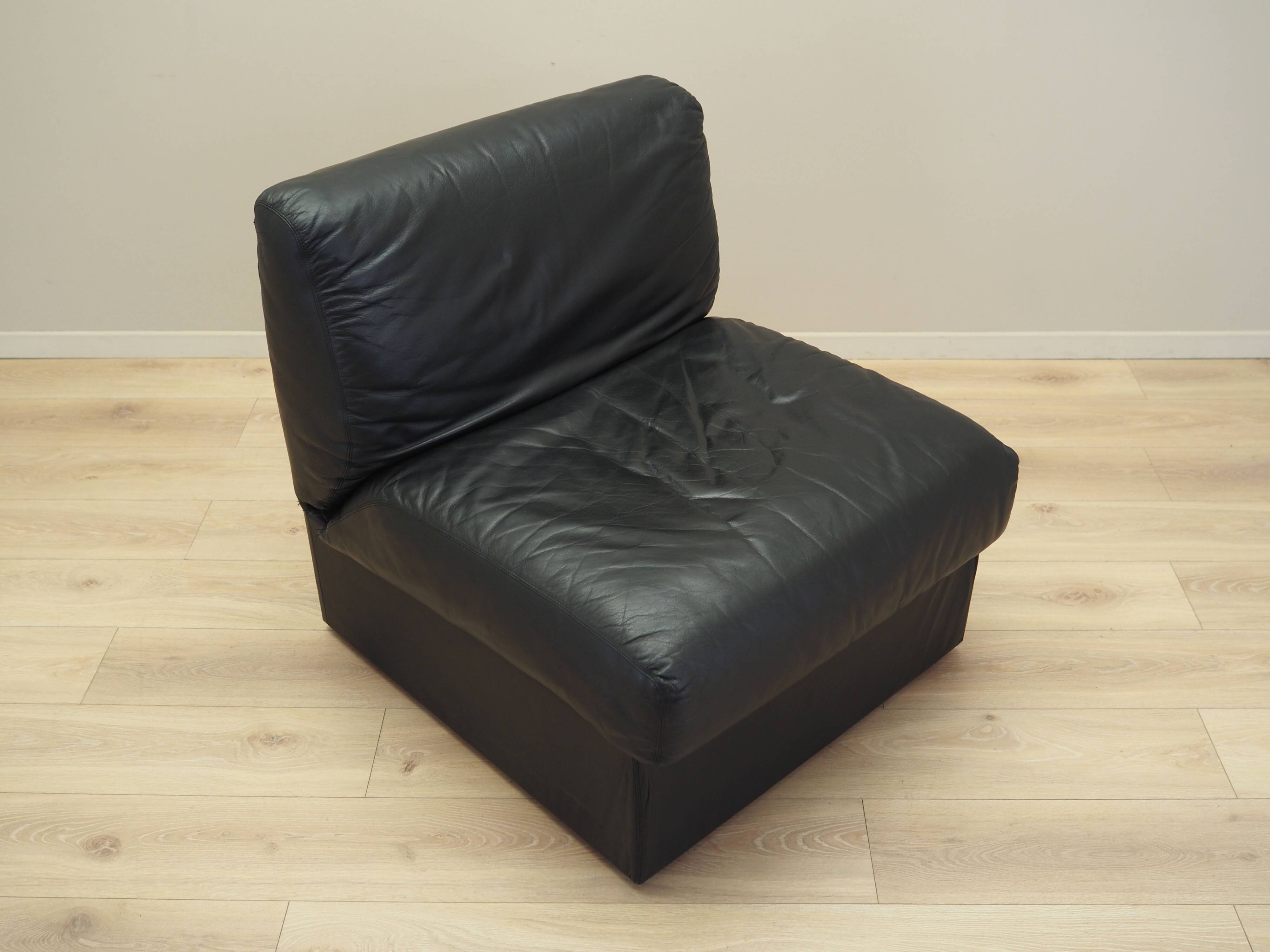 Black leather pouffe/armchair, Italian design, 1960s, production: Italy