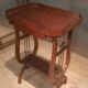 19th-century worker with a lyre footstool.