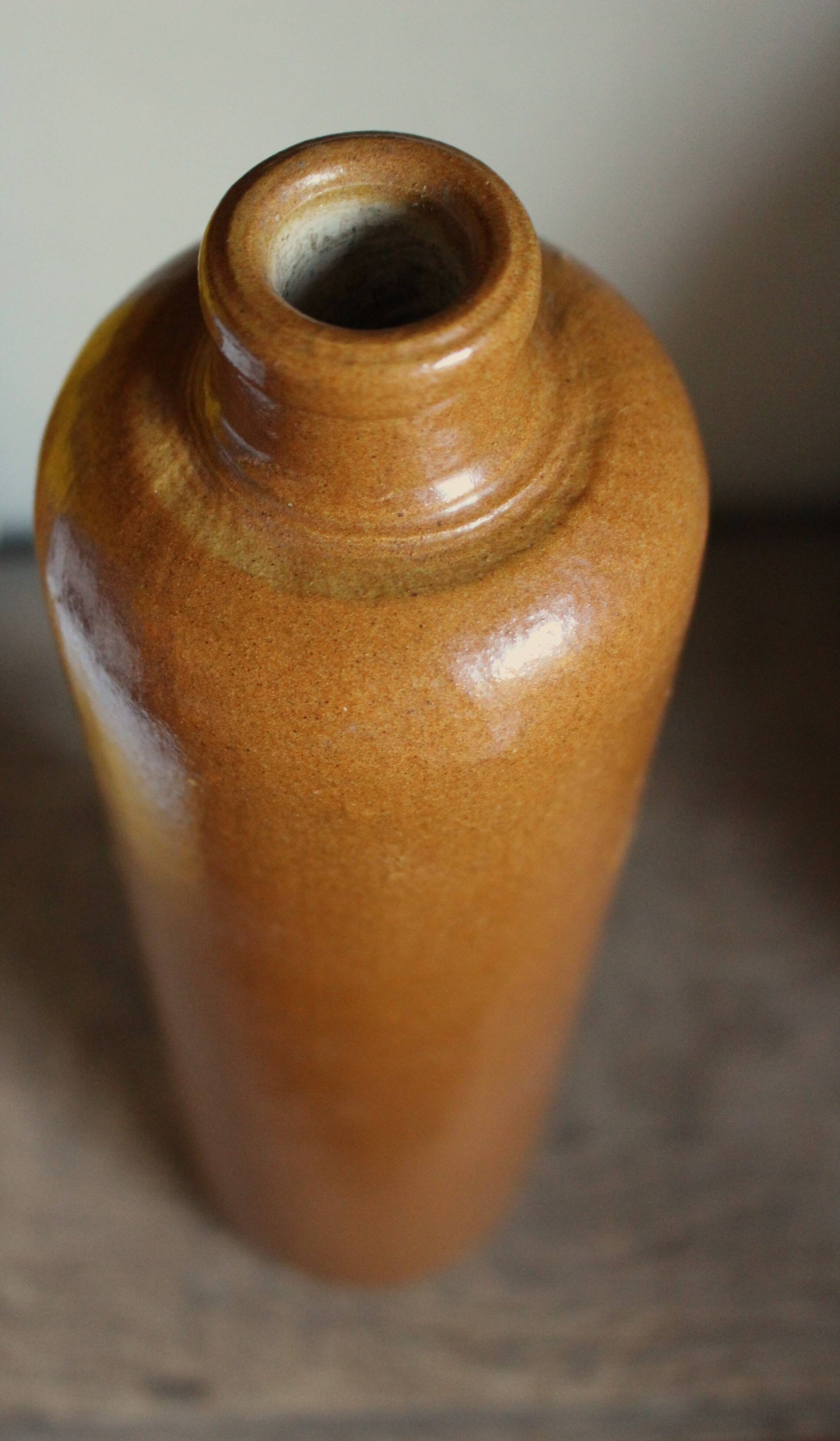 Large antique vintage stoneware liqueur bottle