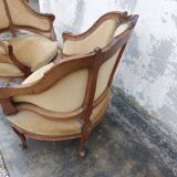 Pair of armchairs basket louis XV in carved walnut