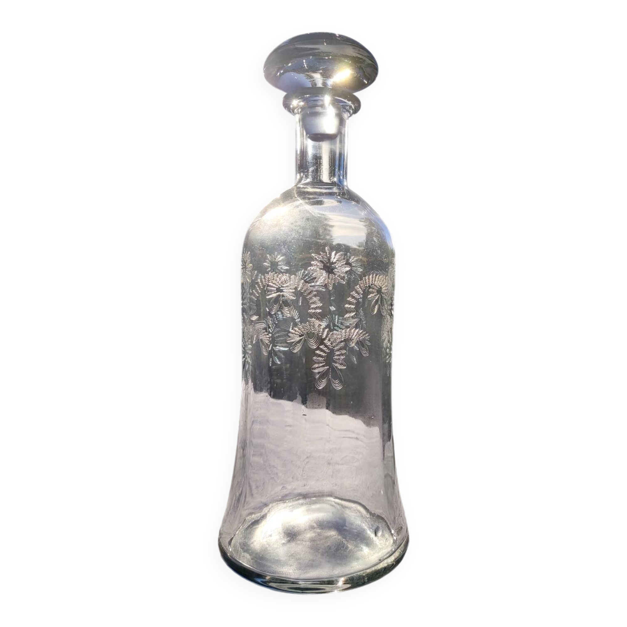 Two antique engraved glass bottles