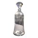Two antique engraved glass bottles