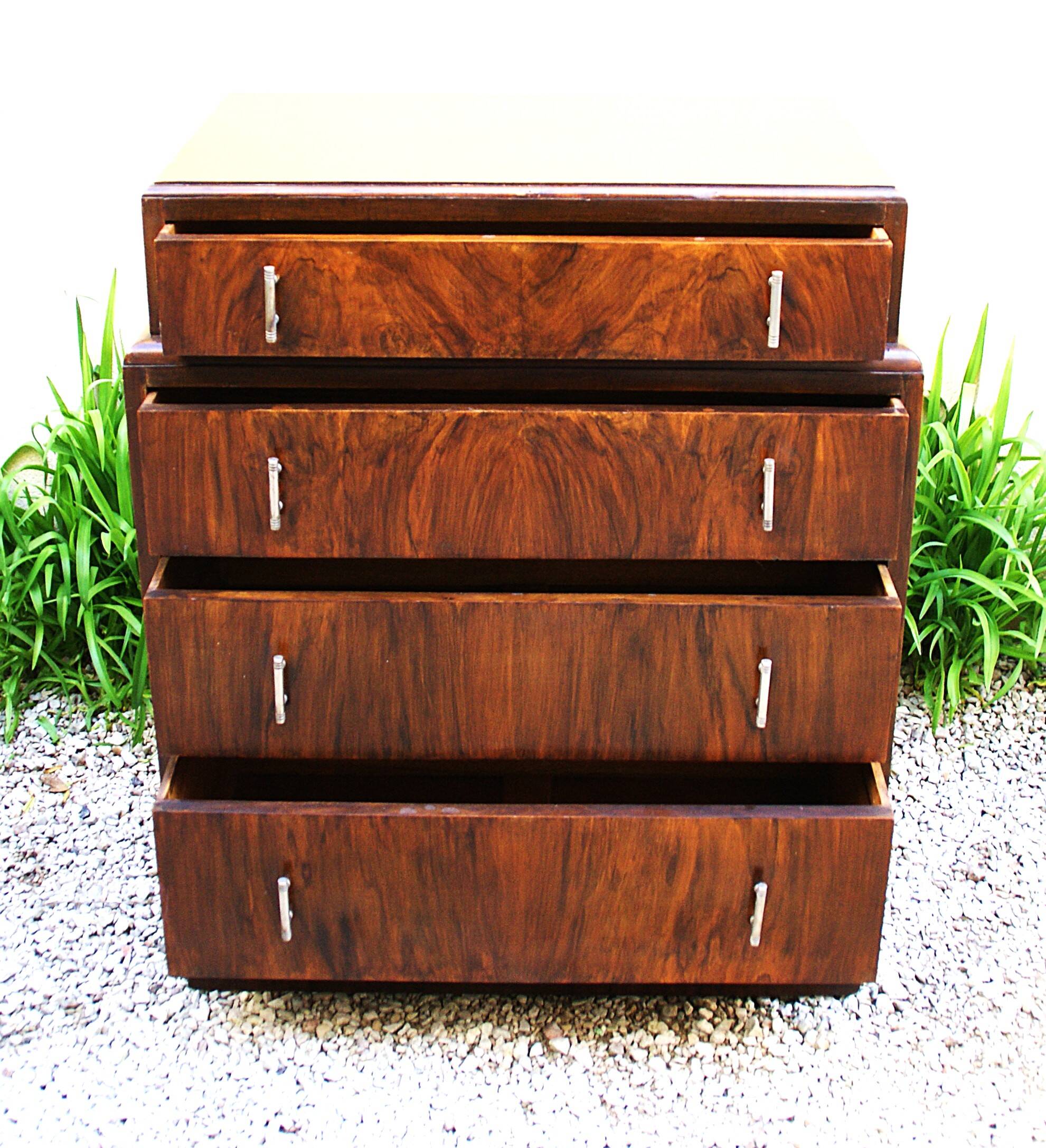 Pretty little Art Deco chest of drawers from the 1930s in walnut.