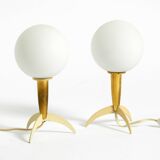 Two Mid-Century Modern rocket table lamps in brass and glass