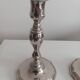 Pair of silver-plated metal candlesticks