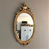 Oval gilded mirror baroque style