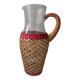 Glass and raffia water carafe