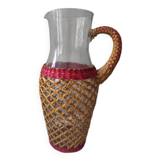 Glass and raffia water carafe