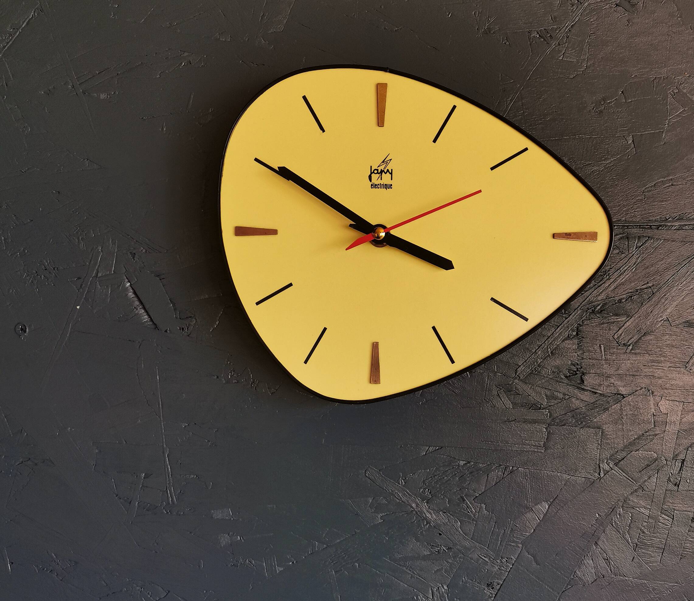 Vintage Formica clock silent asymmetrical wall pendulum "Yellow Japy"
