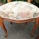 Pair of Louis XV chairs in carved walnut.