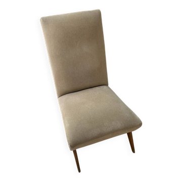 Vintage 1960s armchair with compass legs.