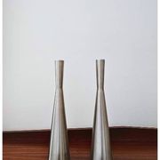 Pair of vintage brushed metal candlesticks