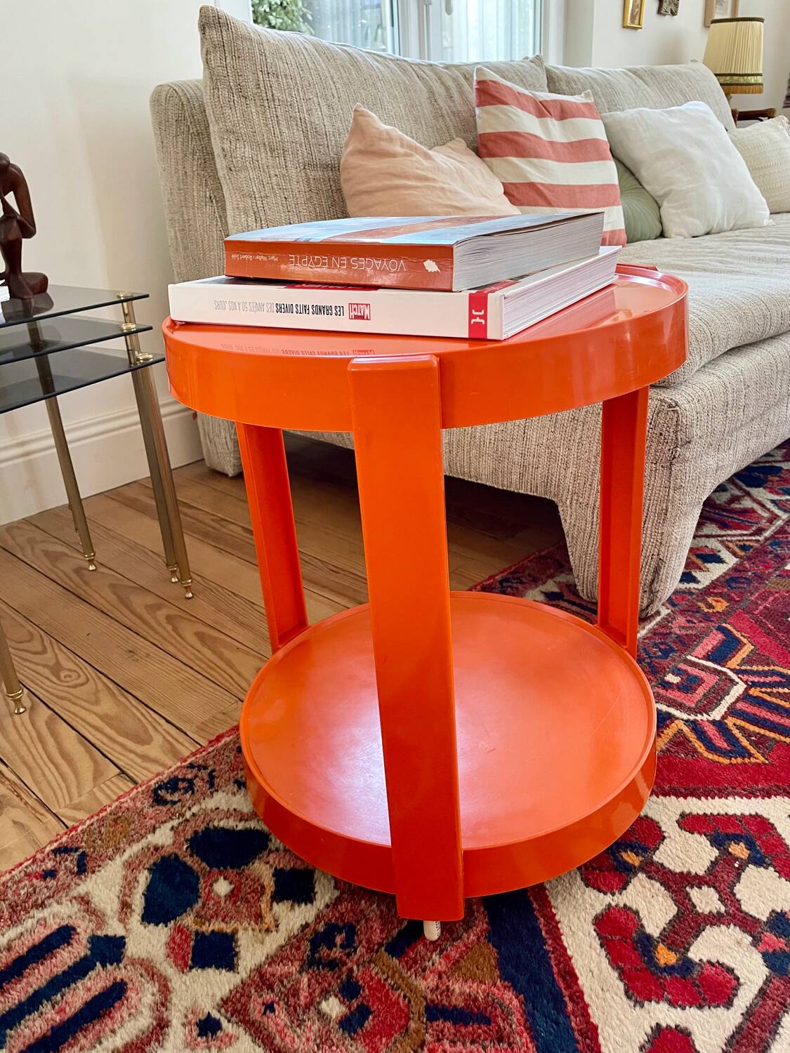 Round orange plastic side table 1970