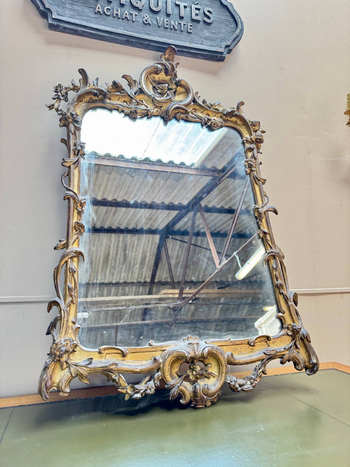 Louis XV period wooden and gilded stucco mirror, 18th century