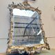 Louis XV period wooden and gilded stucco mirror, 18th century