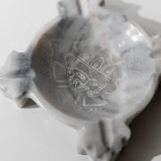 Vintage Mexican marble ashtray from the 1970s, engraved Aztec pattern.