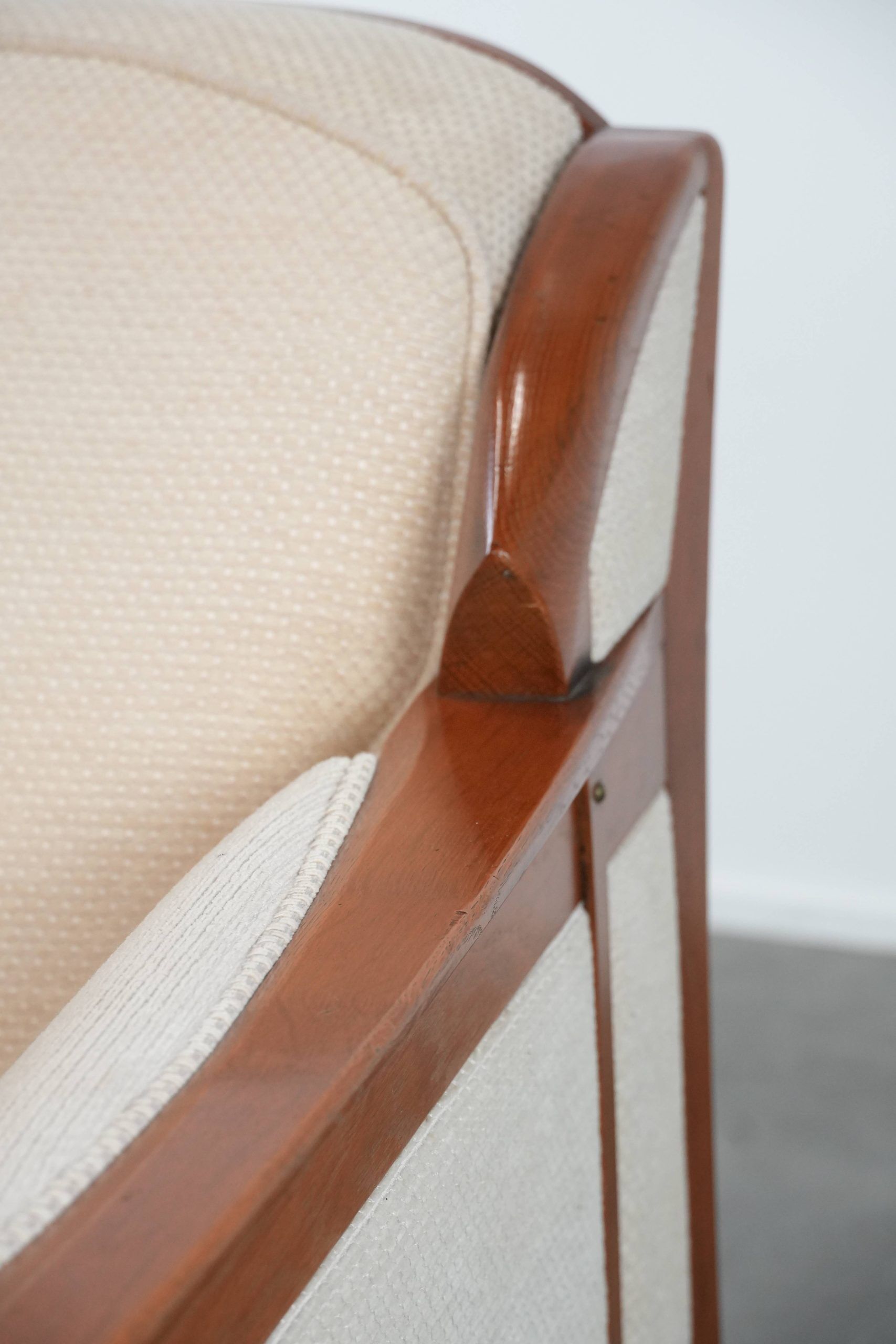 Art Nouveau design armchair with a luxurious light fabric upholstery