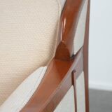 Art Nouveau design armchair with a luxurious light fabric upholstery