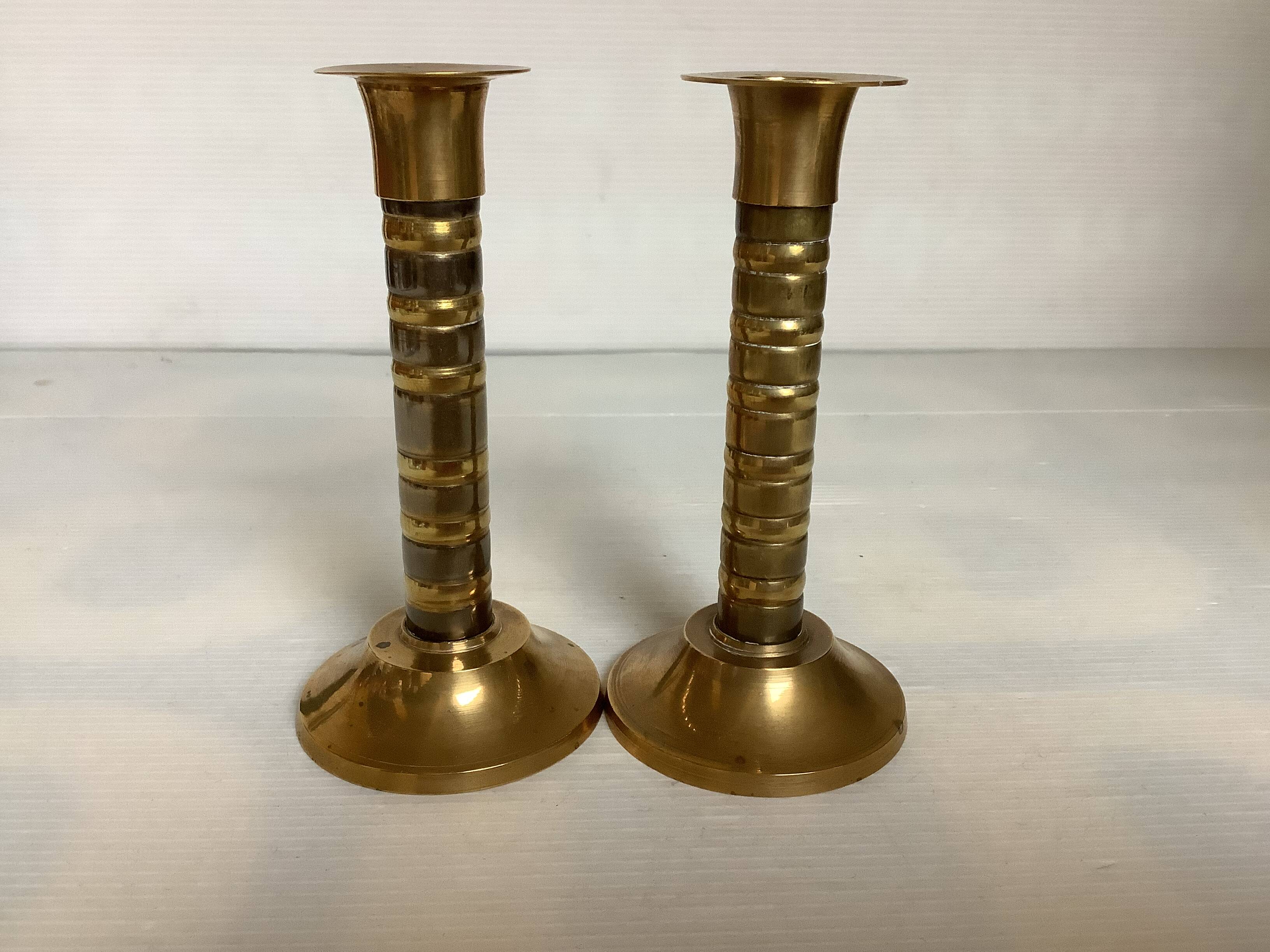 Pair of small two-tone brass candlesticks