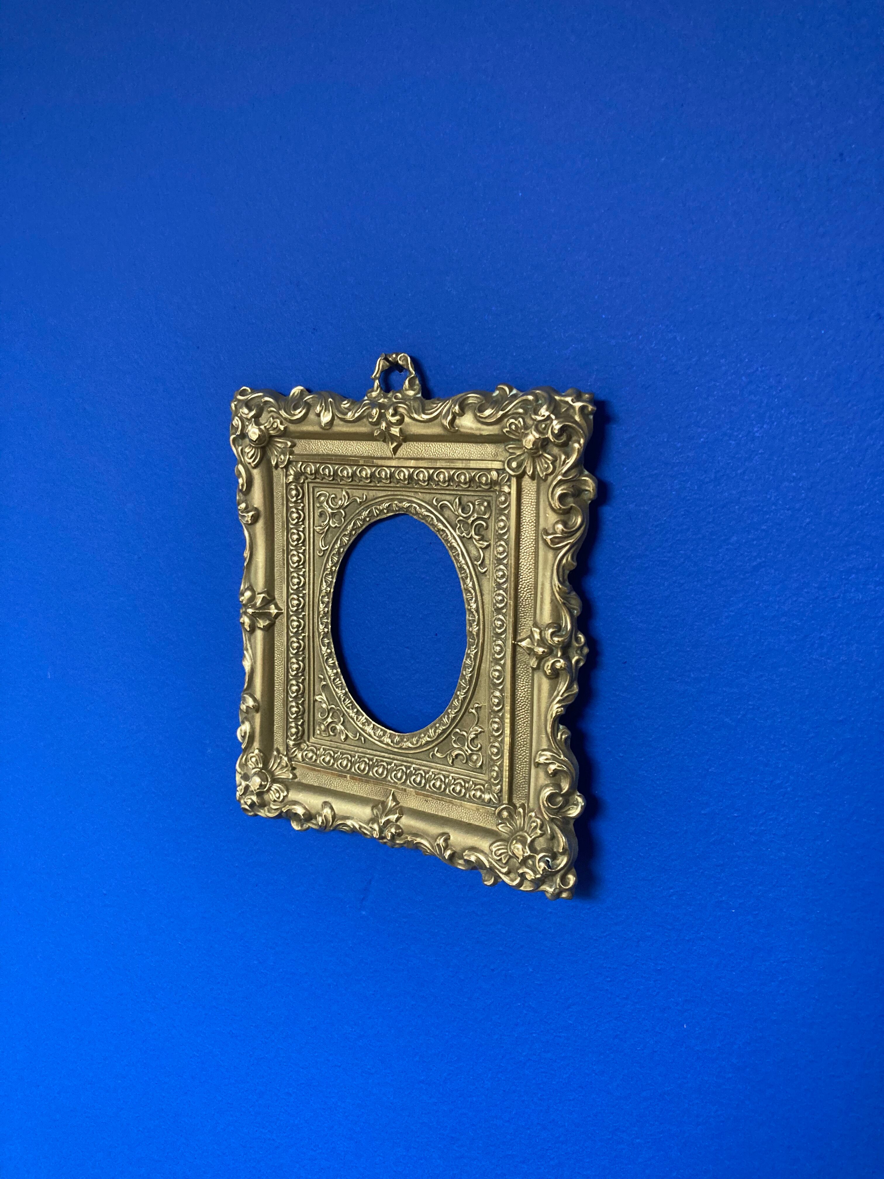 Pair of brass photo frames