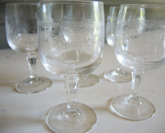Set of 24 old engraved crystal foot glasses