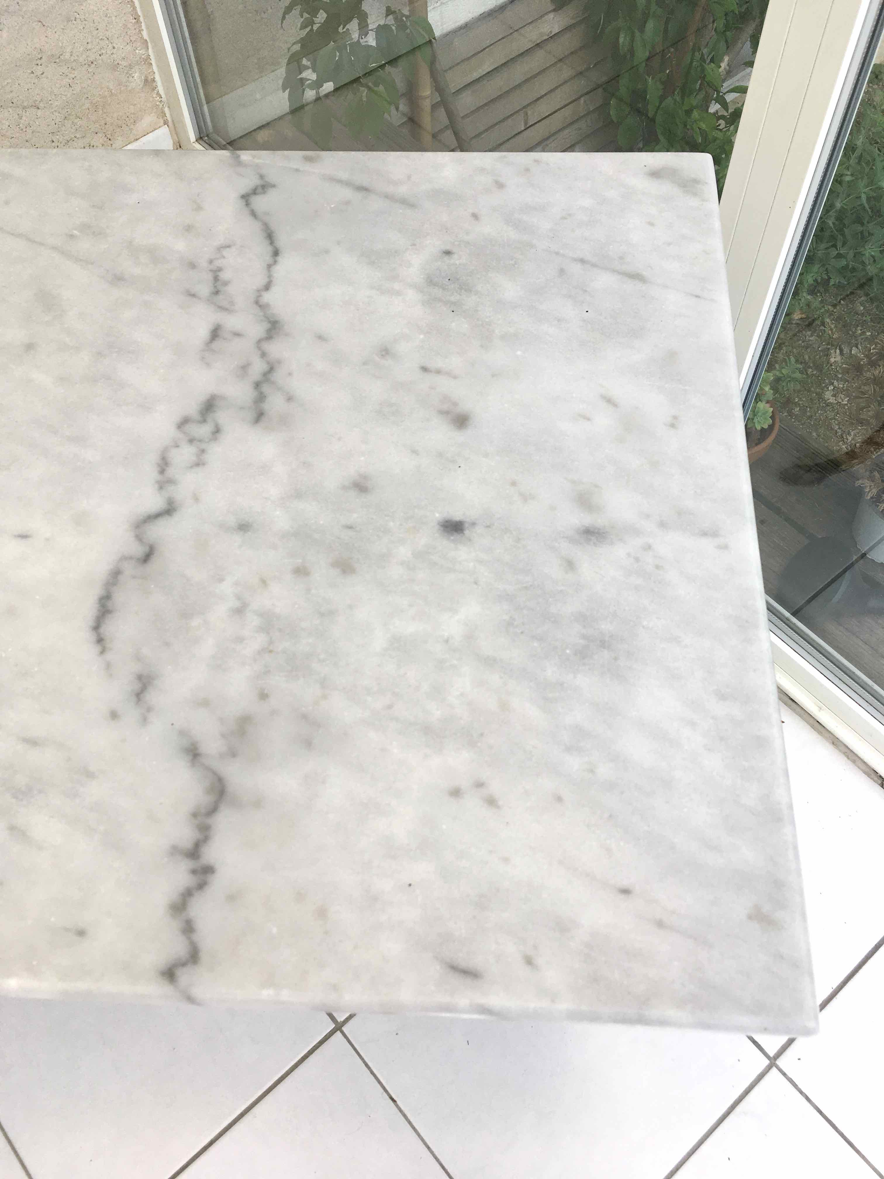 Marble and cast iron bistro table