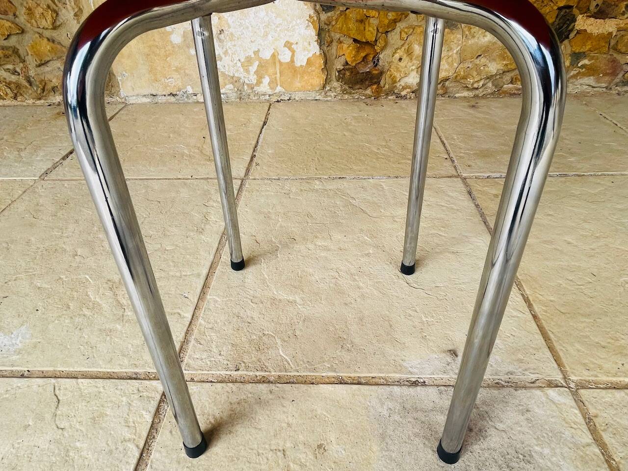 Tabouret vintage skaï orange et pieds chrome circa 70s