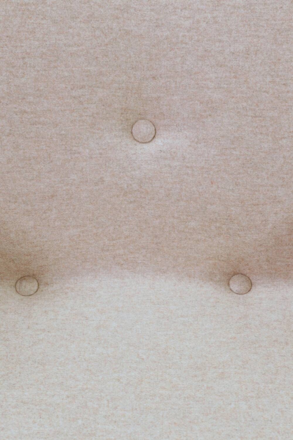 Mid-century modern armchair in camel wool with oak wood.